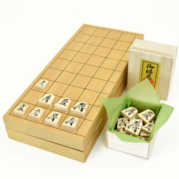 楽天市場】木製将棋セット 新桂10号折将棋盤セット(将棋駒優良押し駒