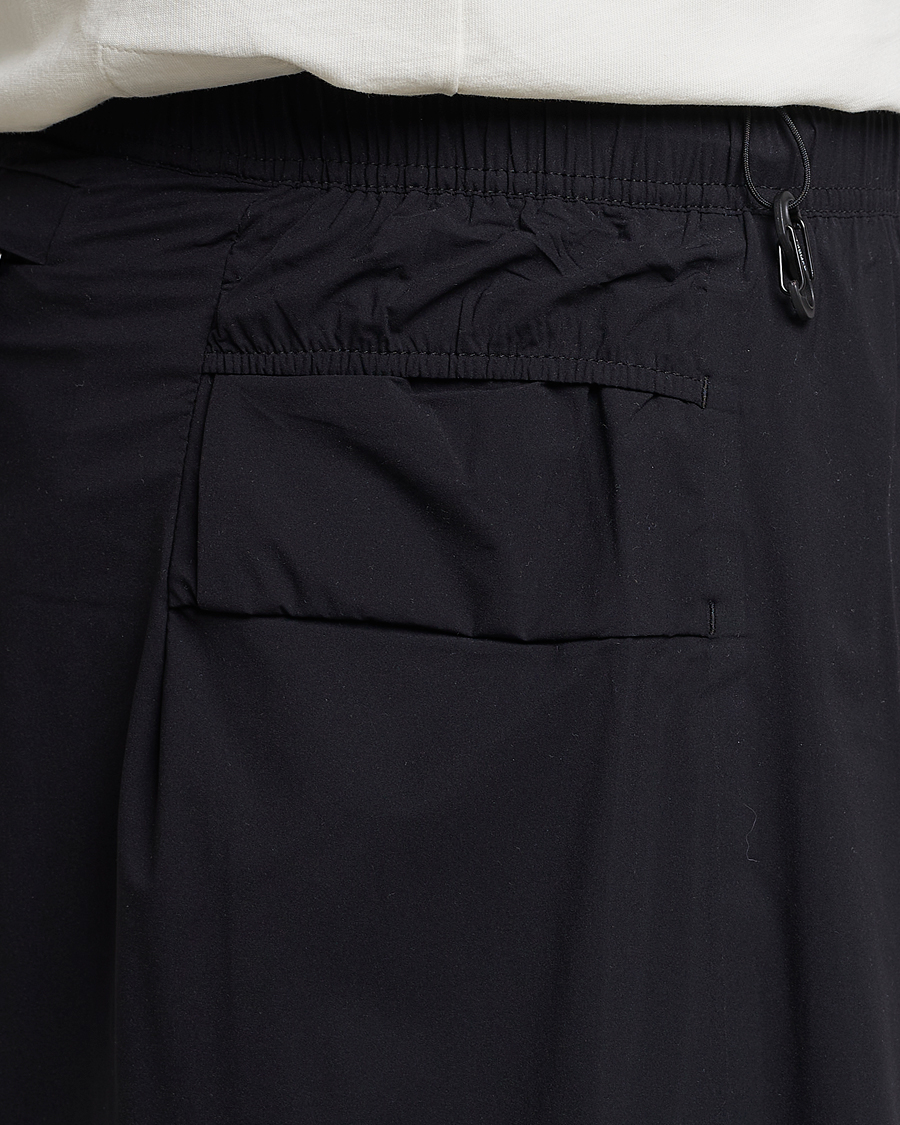 Satisfy Justice 10 Inch Trail Shorts Black at CareOfCarl.com