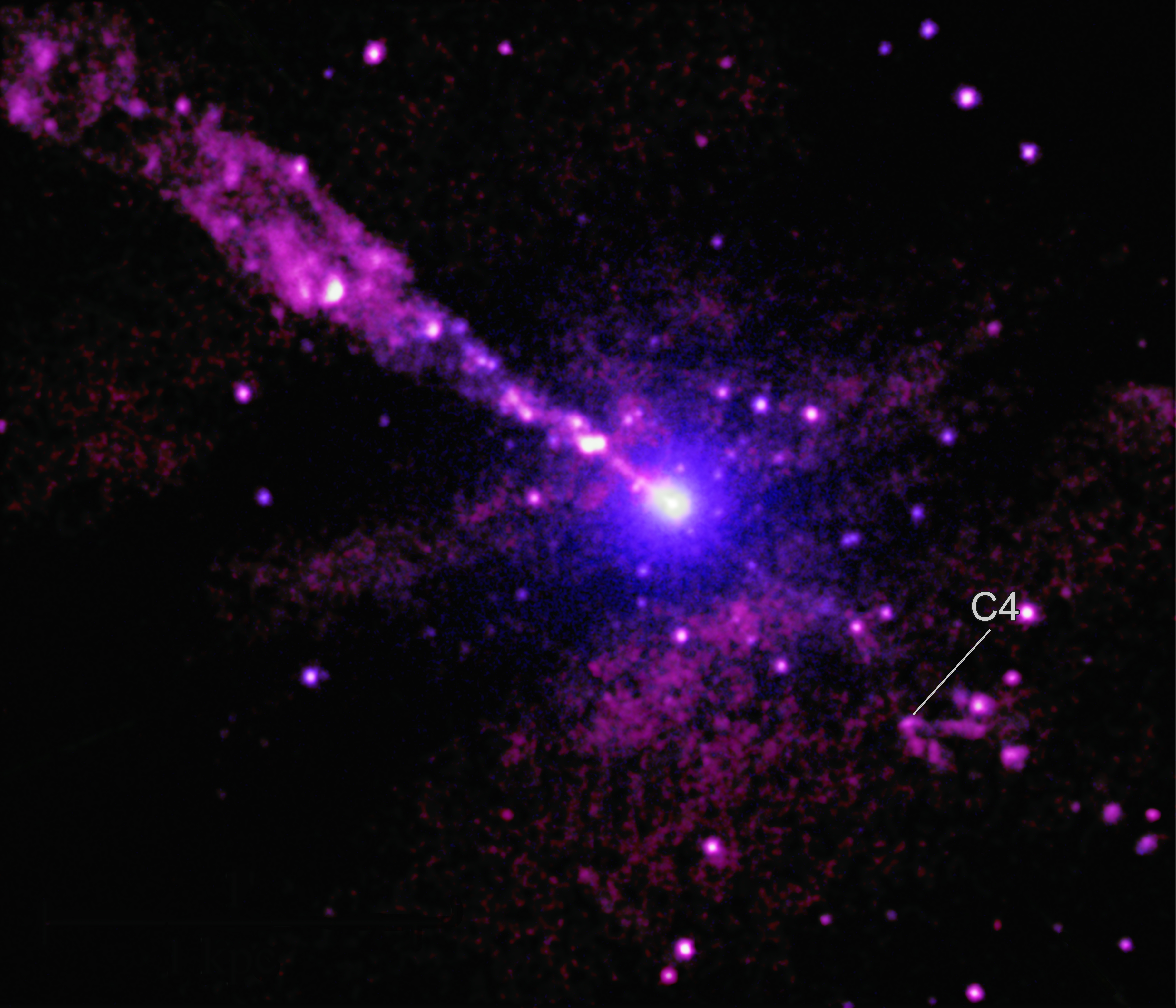 超巨大ブラックホールから高エネルギー粒子が噴出、謎の天体と衝突する