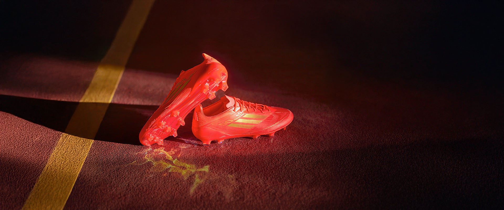 adidas F50 x Salah Elite Firm Ground - Solar Red/Gold Met/Bright