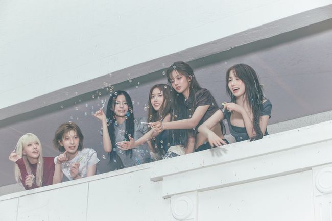 NMIXX Debuts 'Blue Valentine' with LOVE↔HATE Dual Themes