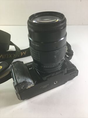 Minolta Maxxum 7000 35mm Film Camera w/ Sigma auto focus 35-135mm