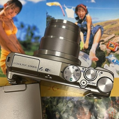 Nikon COOLPIX S9900 Digital Camera 16.0MP 30x Optical Zoom Built