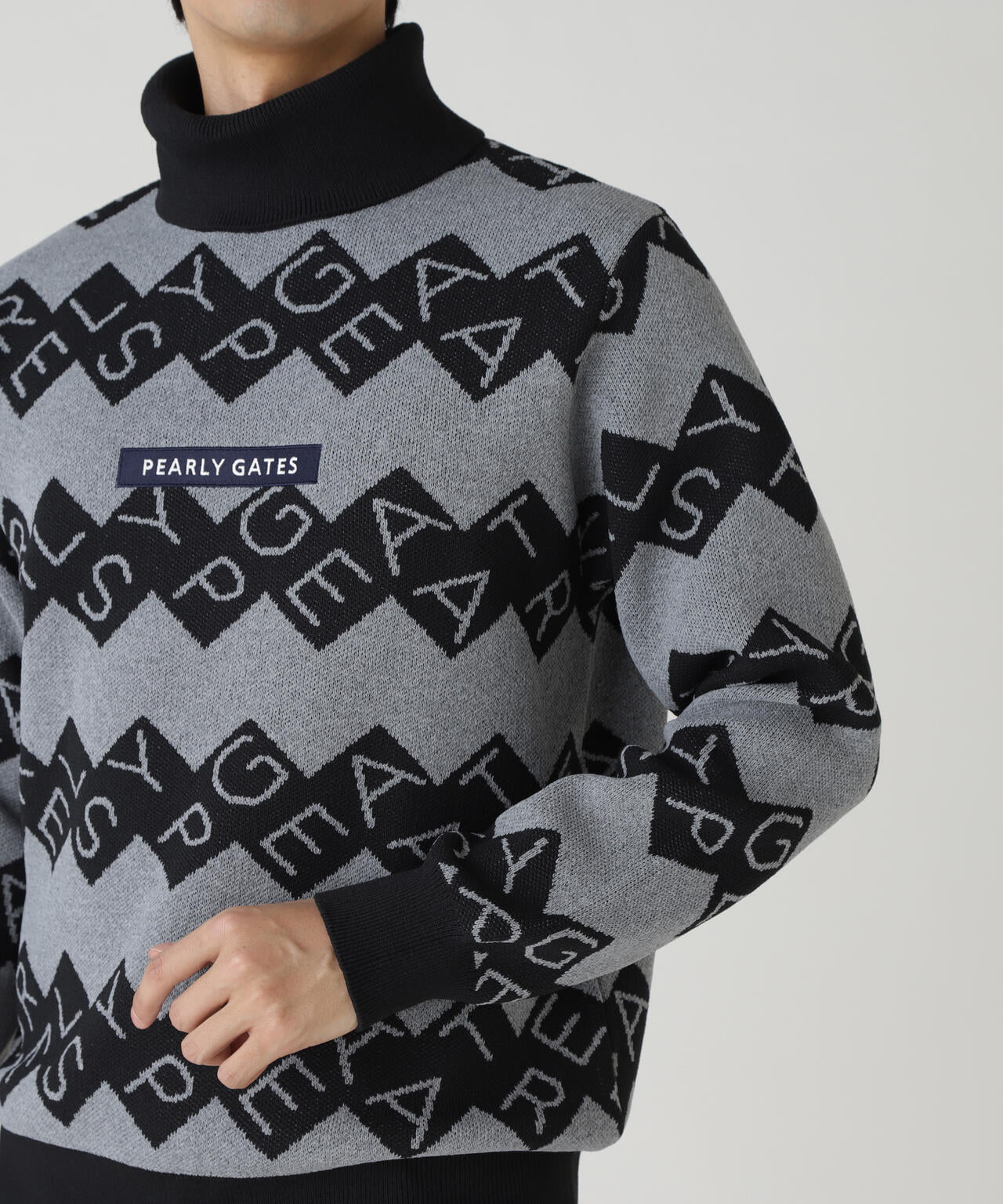 ダブルJQロゴギザボーダー柄タートルニットプルオーバー | PEARLY