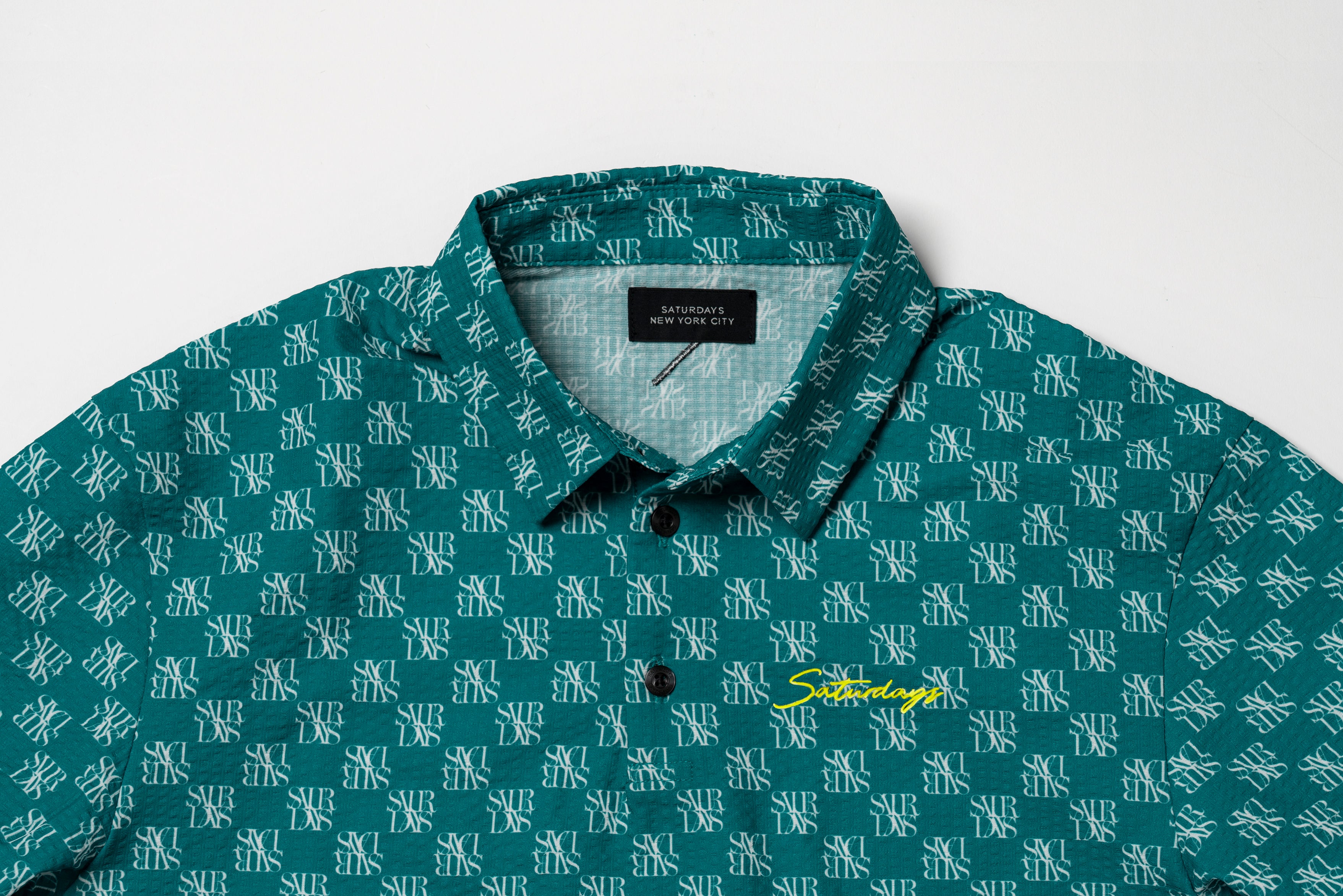 サタデーズニューヨークシティ]別注シアサッカーポロ – FUNQTEN