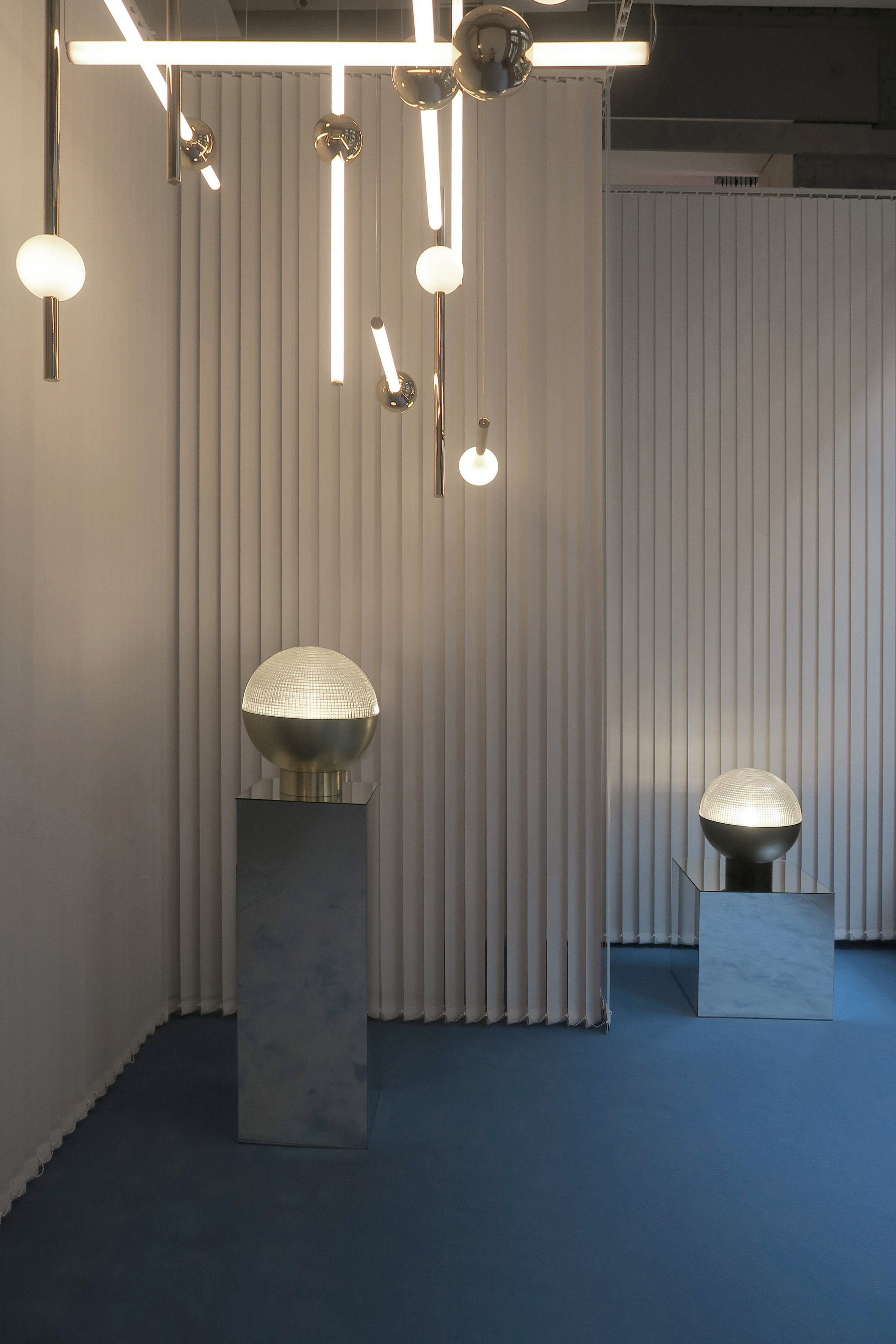 Lee Broom debuts globe-shaped lamp in New York