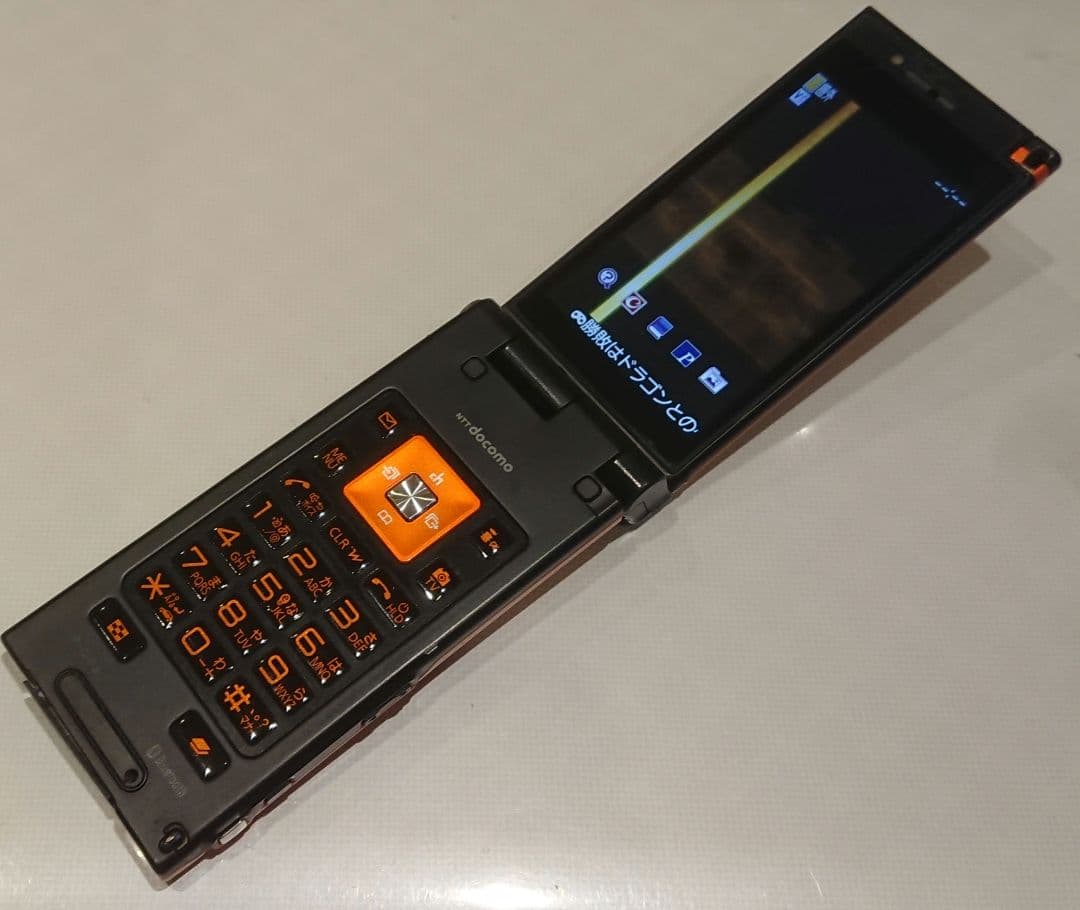 ドコモ docomo P-04B オレンジ ガラケー ゲーム ガンダム 携帯|mercari