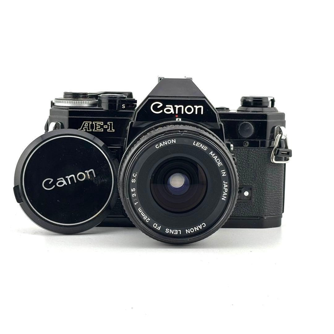 【完動品】 Canon AE-1 + FD 23mm F3.5 フィルム一眼 プログラムオートでフィルム初心者でも安心】レトロな見た目が可愛い