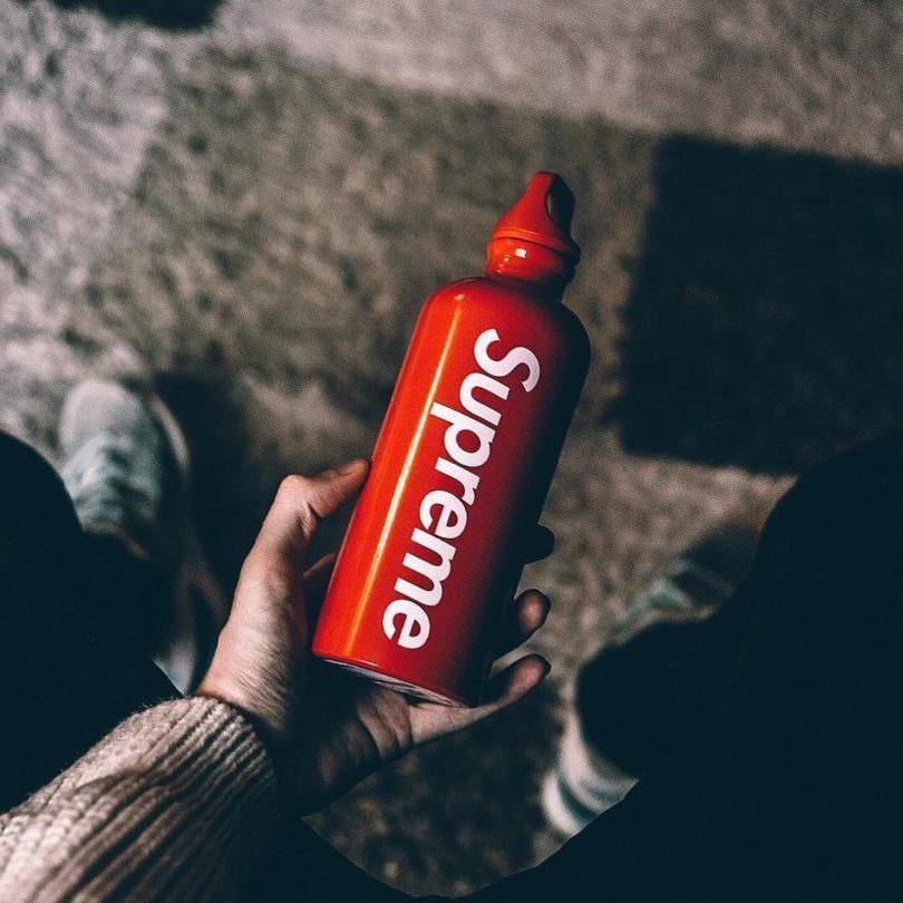 Supreme branded Sigg water bottles as company merchandise